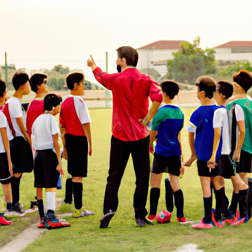 Huấn luyện viên hướng dẫn đội bóng trẻ tại Sân Bóng Trung Văn